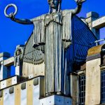 Art Nouveau angel in Vienna, Austria. This angel is one of a pair sculpted by Othmar Schimkowitz on the top of the Austrian Savings Bank. lem_180612NEF-0921-AP