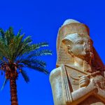 Colossus of Ramesses II in front of the entrance to the Great Hipostyle Hall in the temple of Amun at Karnak. Ramesses II is regarded as the greatest pharaoh of the New Kingdom